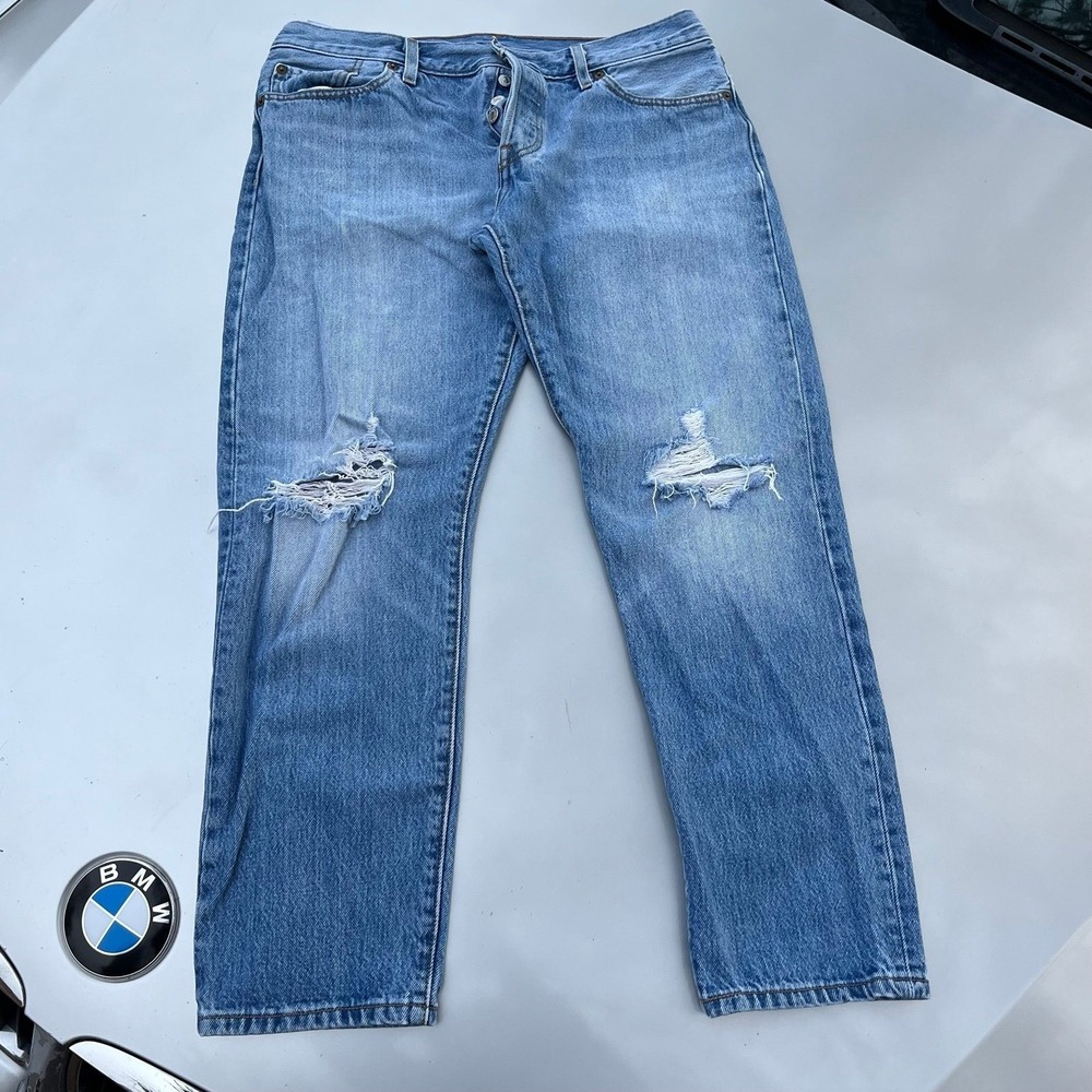Levi's 501 customized, ripped and tapered blue jeans